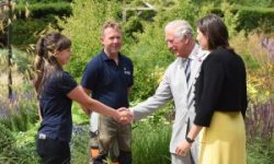 The-Prince-of-Wales-meets-gardener-Emma-Bouchard-with-gardener-Paul-Eaton-and-garden-designer-Marie-Louise-Agius-right-in-the-Centenary-Garden