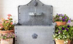 Metal water feature fountain Arthur Jack and Co planters UK British made - Made in England Britain photography by Stephen Studd photographer