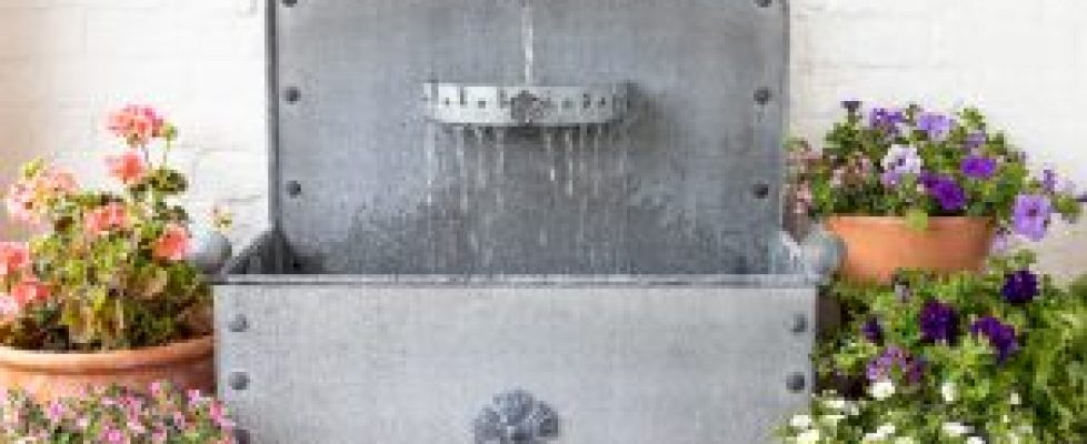 Metal water feature fountain Arthur Jack and Co planters UK British made - Made in England Britain photography by Stephen Studd photographer